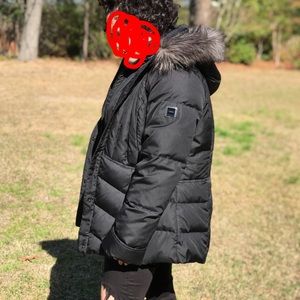 A Calvin Klein puffer jacket with fur